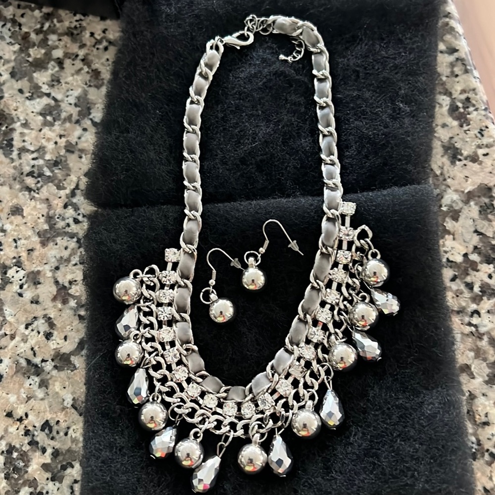 Silver necklace with matching earrings